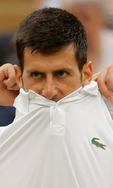Djokovic reaches Wimbledon quarters with injured shoulder